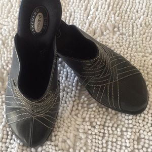 Black mules with white top stitching